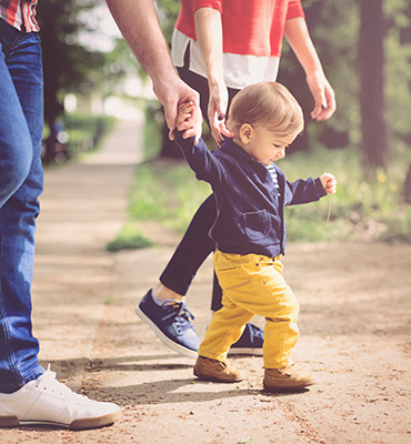 Family walking in a park