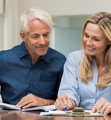 Older couple working on finances