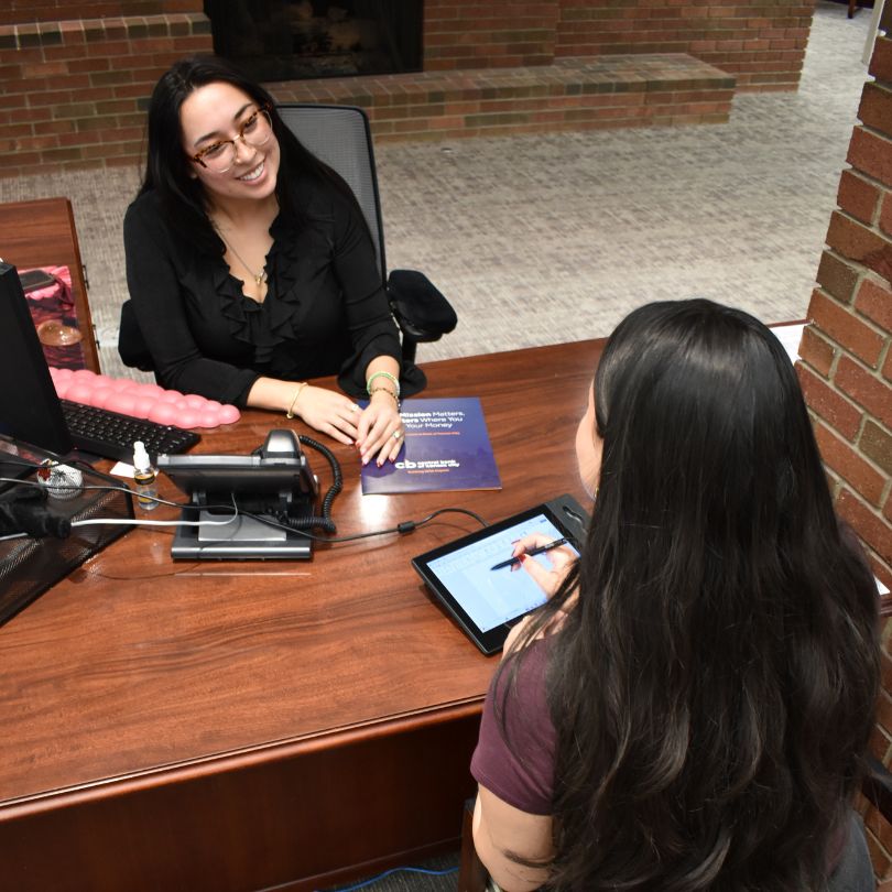 Staff with customer