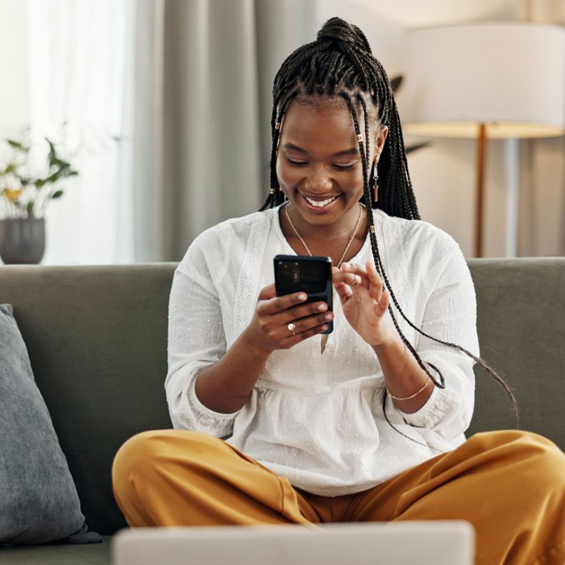 Girl on phone smiling